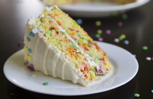 A soft, fluffy vanilla funfetti cake studded with rainbow sprinkles and topped with a rich vanilla buttercream.